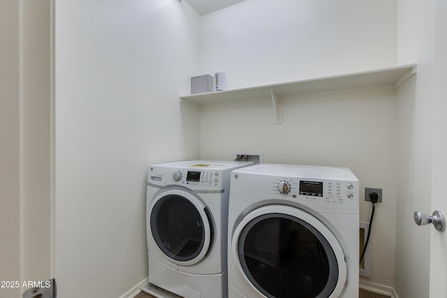 14870 W Encanto Blvd Unit 2006, Goodyear, AZ 85395 - laundry area with washing machine and clothes dryer and baseboards