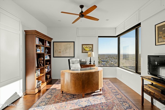 office area featuring ceiling fan and wood-type flooring