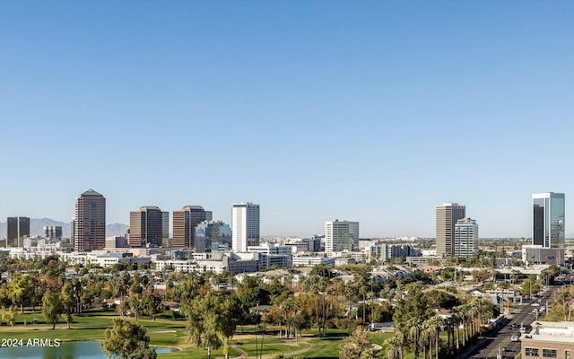 property's view of city featuring a water view