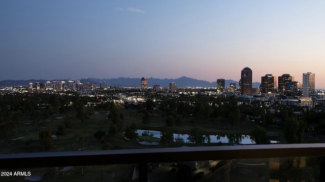 property's view of city featuring a water view