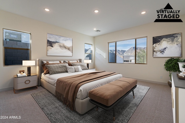 bedroom featuring visible vents, recessed lighting, baseboards, and light carpet