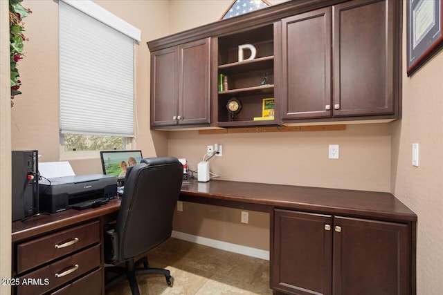 office area featuring built in desk