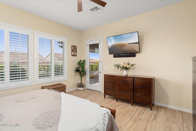 bedroom with light wood-type flooring, access to outside, and ceiling fan