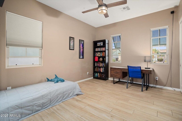 bedroom featuring ceiling fan and light hardwood / wood-style flooring