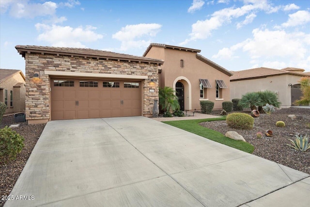 view of front of property featuring a garage