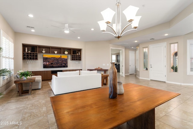 12935 W Lone Tree Trl, Peoria, AZ 85383 - dining room with light tile patterned floors, recessed lighting, a ceiling fan, and baseboards