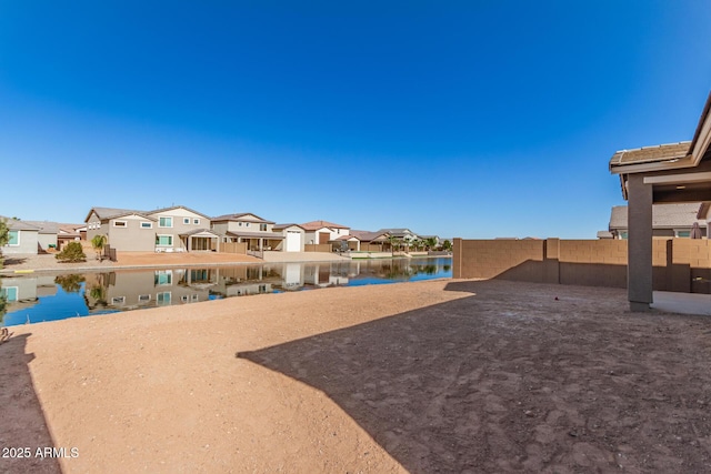 view of yard with a water view