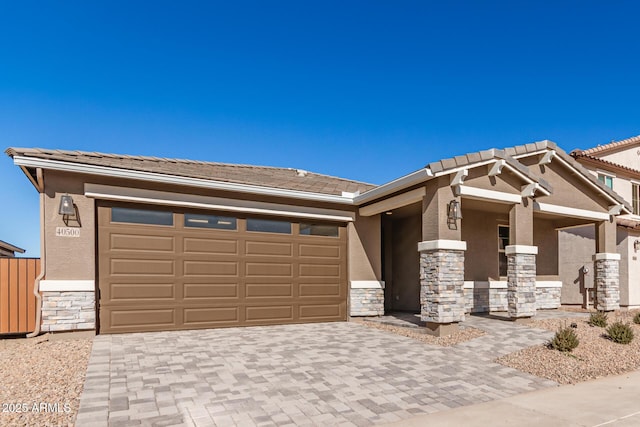 view of front of property featuring a garage