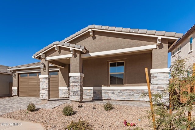 view of front of home with a garage