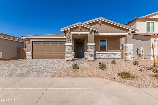 view of front of property with a garage