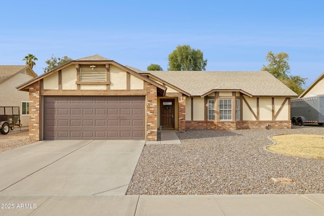 view of front of property with a garage