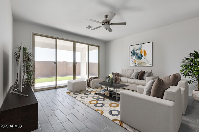 living room featuring plenty of natural light, dark wood-type flooring, and ceiling fan