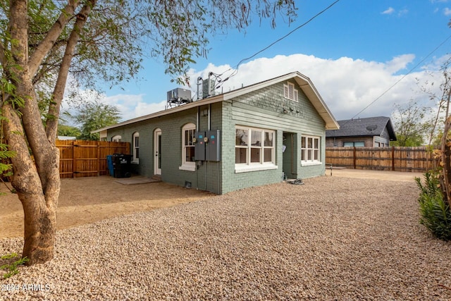 rear view of property featuring a patio