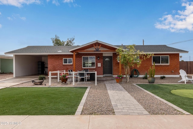 ranch-style house with a carport