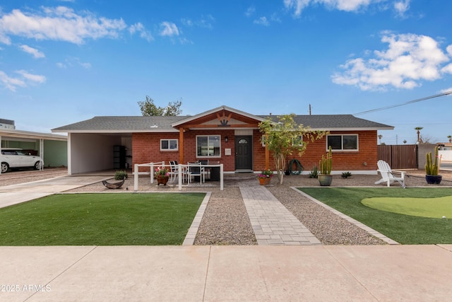 single story home with a carport