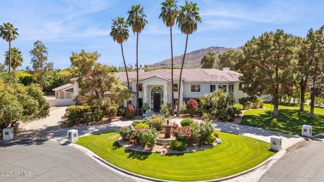 6467 E Sierra Vista Dr, Paradise Valley, AZ 85253 - view of front of home featuring a mountain view and a front lawn