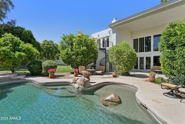 6467 E Sierra Vista Dr, Paradise Valley, AZ 85253 - view of swimming pool featuring stairs and a patio