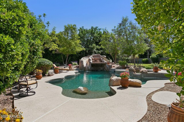 6467 E Sierra Vista Dr, Paradise Valley, AZ 85253 - outdoor pool featuring a patio area