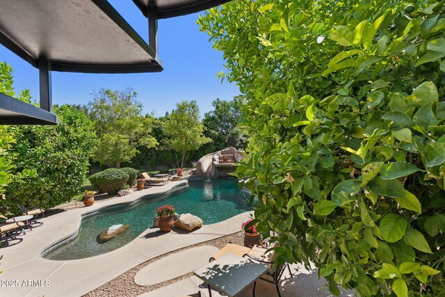 6467 E Sierra Vista Dr, Paradise Valley, AZ 85253 - pool with a water slide and a patio