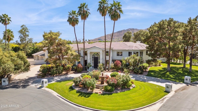 6467 E Sierra Vista Dr, Paradise Valley, AZ 85253 - view of front of home featuring a mountain view and a front lawn