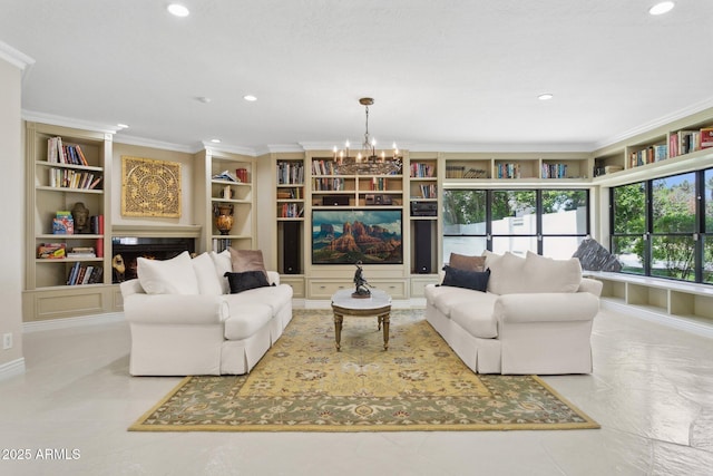 6467 E Sierra Vista Dr, Paradise Valley, AZ 85253 - living area with an inviting chandelier, ornamental molding, recessed lighting, and built in shelves