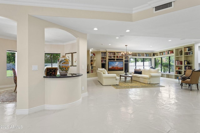 6467 E Sierra Vista Dr, Paradise Valley, AZ 85253 - living area featuring arched walkways, baseboards, recessed lighting, and visible vents