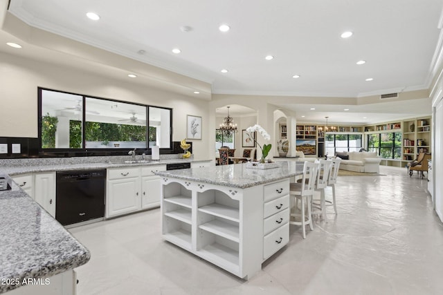 6467 E Sierra Vista Dr, Paradise Valley, AZ 85253 - kitchen with crown molding, open shelves, an inviting chandelier, dishwasher, and a kitchen island