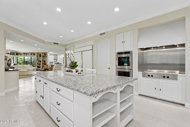 6467 E Sierra Vista Dr, Paradise Valley, AZ 85253 - kitchen with visible vents, open shelves, double oven, ornamental molding, and white cabinetry