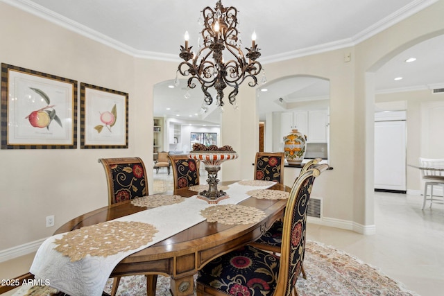6467 E Sierra Vista Dr, Paradise Valley, AZ 85253 - dining space featuring recessed lighting, arched walkways, and ornamental molding