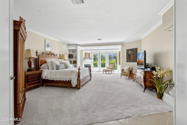 6467 E Sierra Vista Dr, Paradise Valley, AZ 85253 - carpeted bedroom featuring access to outside, ornamental molding, visible vents, and french doors