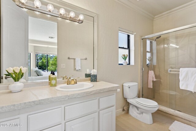 6467 E Sierra Vista Dr, Paradise Valley, AZ 85253 - bathroom with vanity, ornamental molding, a stall shower, and toilet