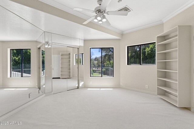 6467 E Sierra Vista Dr, Paradise Valley, AZ 85253 - unfurnished bedroom with carpet floors, ornamental molding, baseboards, and visible vents