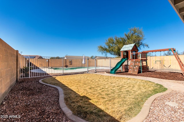 view of jungle gym with a lawn, a fenced backyard, and a community pool