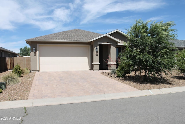 552 Allerton Way, Chino Valley, AZ 86323 - view of front facade featuring decorative driveway, stucco siding, an attached garage, and a shingled roof