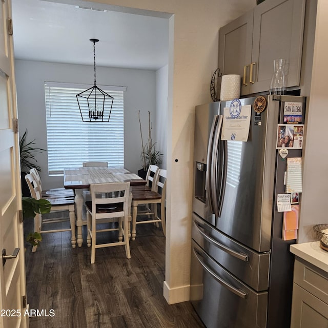552 Allerton Way, Chino Valley, AZ 86323 - kitchen with stainless steel fridge, a chandelier, dark wood-type flooring, gray cabinetry, and light countertops