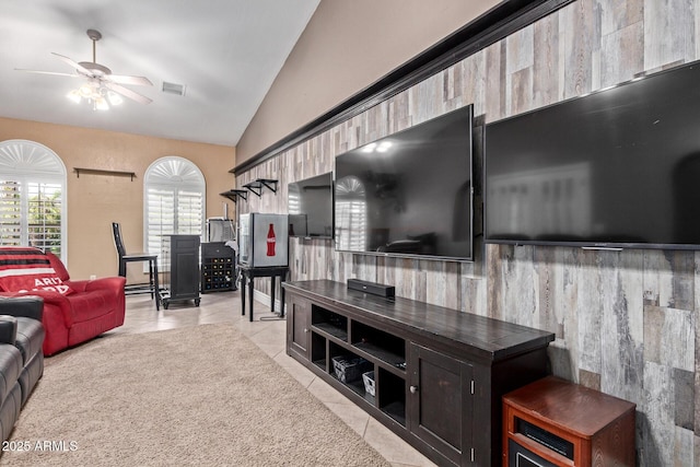 3203 E Ellis St, Mesa, AZ 85213 - living room featuring visible vents, a ceiling fan, lofted ceiling, and light tile patterned flooring