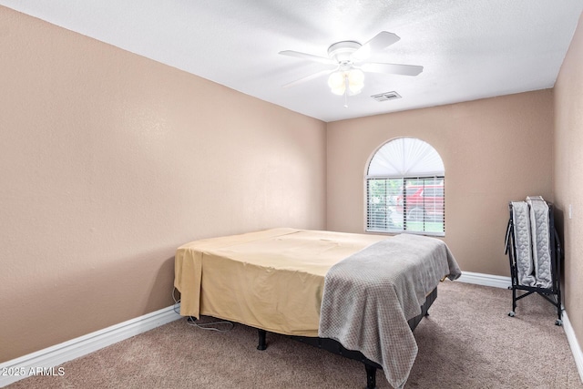 3203 E Ellis St, Mesa, AZ 85213 - bedroom featuring visible vents, a ceiling fan, carpet, and baseboards