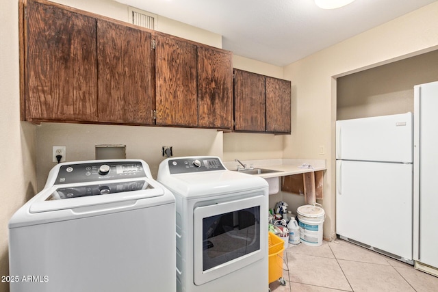 3203 E Ellis St, Mesa, AZ 85213 - washroom with light tile patterned floors, independent washer and dryer, cabinet space, and visible vents
