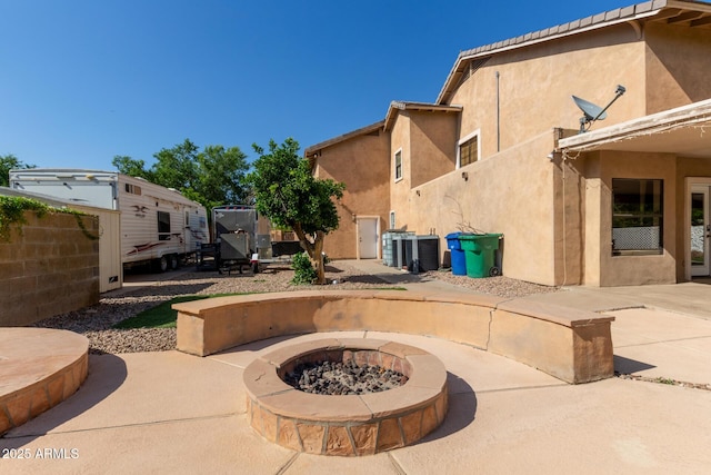 3203 E Ellis St, Mesa, AZ 85213 - view of patio featuring an outdoor fire pit and fence
