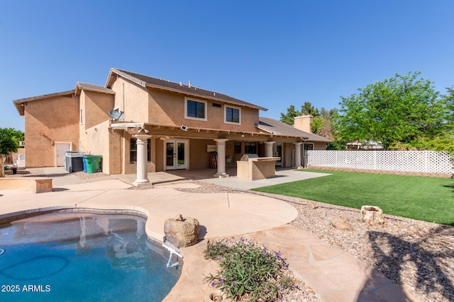 3203 E Ellis St, Mesa, AZ 85213 - rear view of property featuring a patio area, a fenced in pool, fence, a yard, and stucco siding