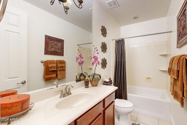 full bathroom featuring vanity, tile patterned flooring, shower / bathtub combination with curtain, and toilet