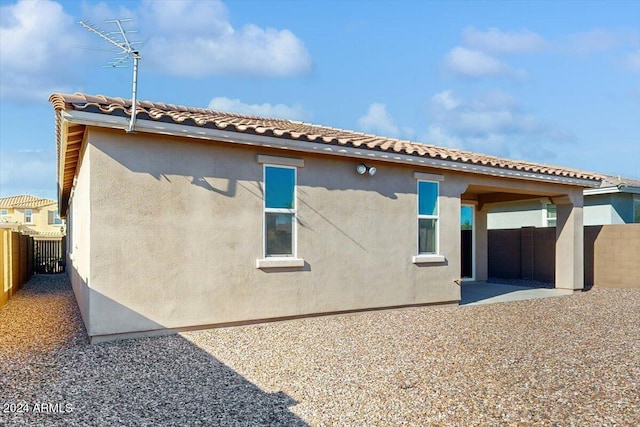 rear view of property with a patio