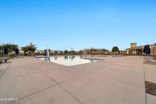 community pool with a patio