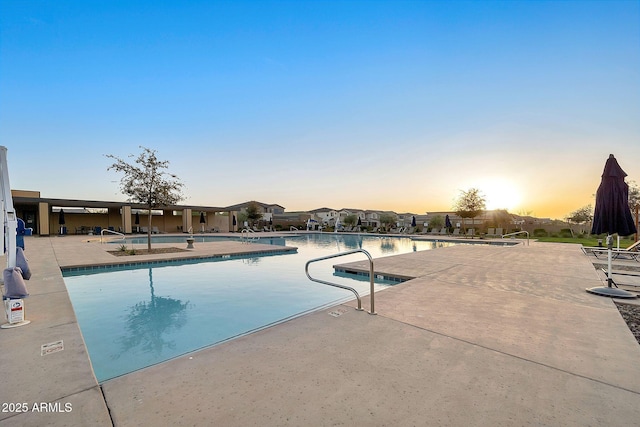 pool with a patio