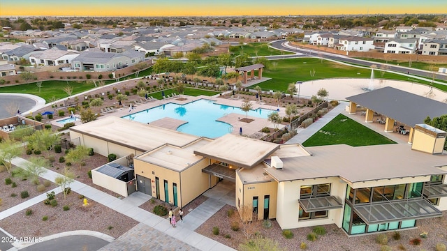 birds eye view of property with a residential view