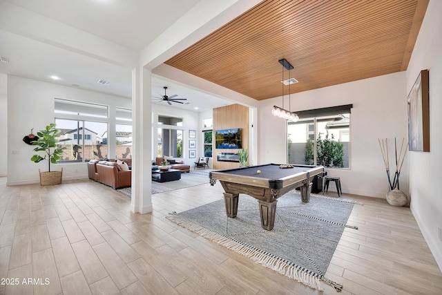 recreation room with light wood finished floors, plenty of natural light, ceiling fan, and pool table