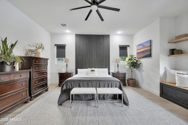 bedroom featuring recessed lighting, a ceiling fan, visible vents, baseboards, and light wood-type flooring