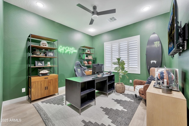 home office with light wood finished floors, visible vents, baseboards, ceiling fan, and recessed lighting