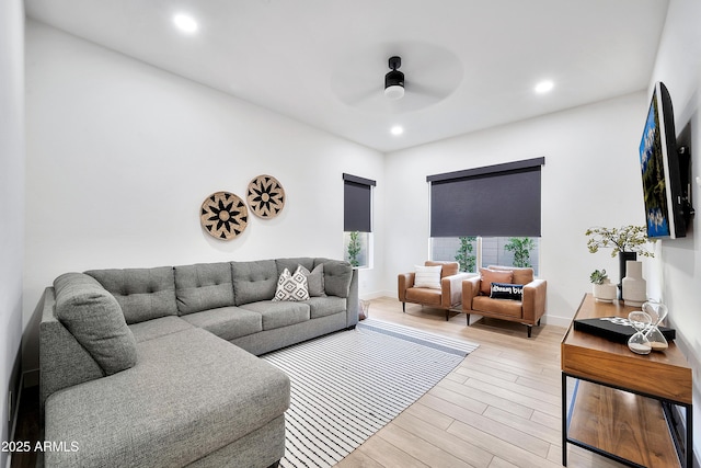 living room with ceiling fan, baseboards, wood finished floors, and recessed lighting