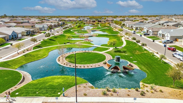 aerial view with a residential view and a water view